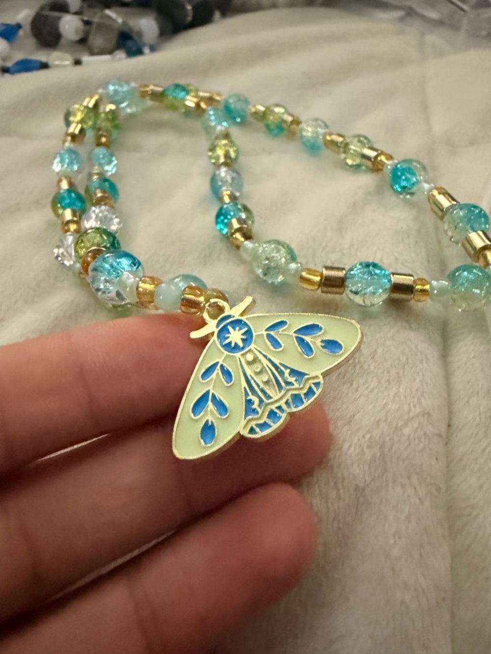 Gold Moth Pendant Necklace with Aqua and Teal Beads (no clasp/stretchy)